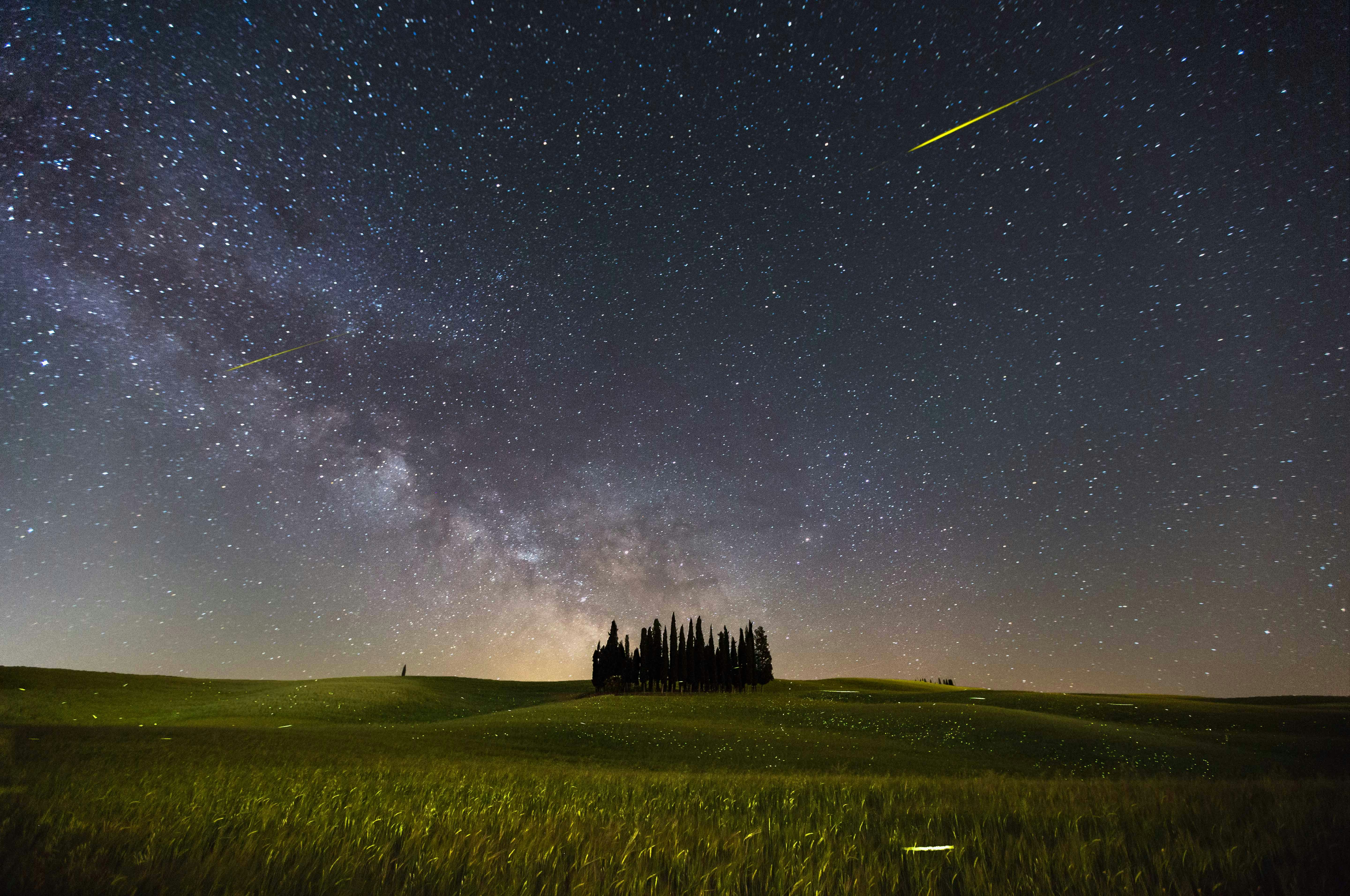 shooting star and milky way at night